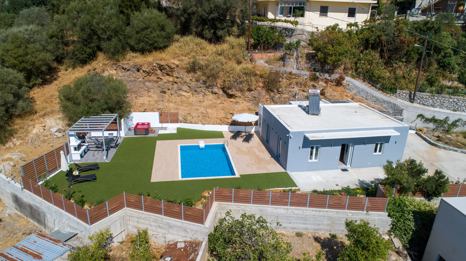 Villa Neonis and its private pool viewed from above